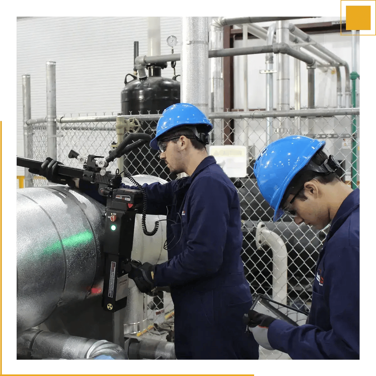 radiographers screening a wide pipe with OpenVision RTR x-Ray system