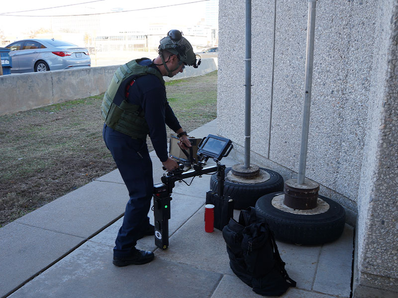 Bomb technician scanning can with OV Security